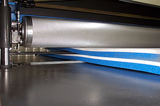 A laminator welder in action