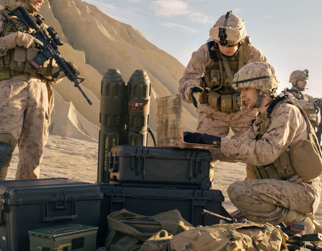 Soldiers using a laptop